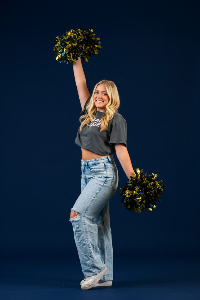 Dancer posing for headshot during dance media day session.